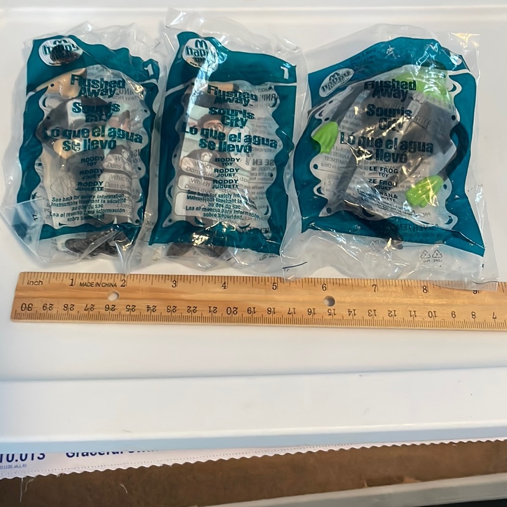 Set of 3 unopened Flushed Away Happy Meal toys